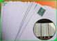 Άσπρο πλάτος ρόλων 75GSM 570MM εγγράφου Woodfree συνήθειας για την παραγωγή των σχολικών βιβλίων